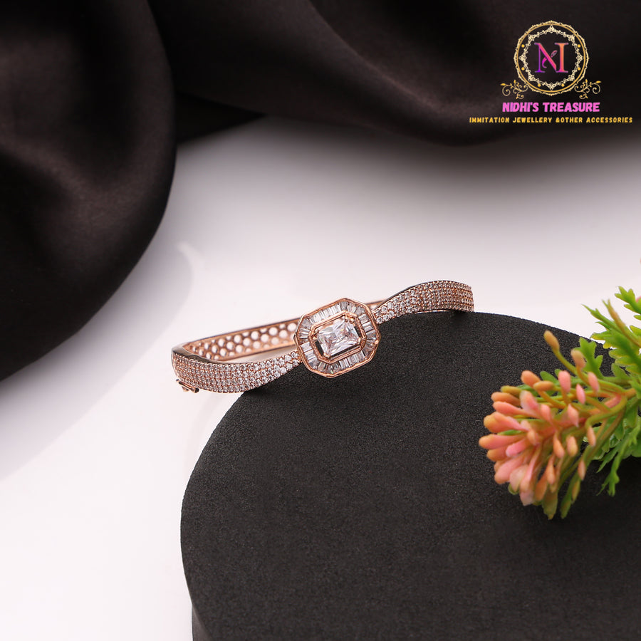 Rose Gold Polish American Diamond Bracelet with Baguette Center Stone and Micro Pave Setting Design
